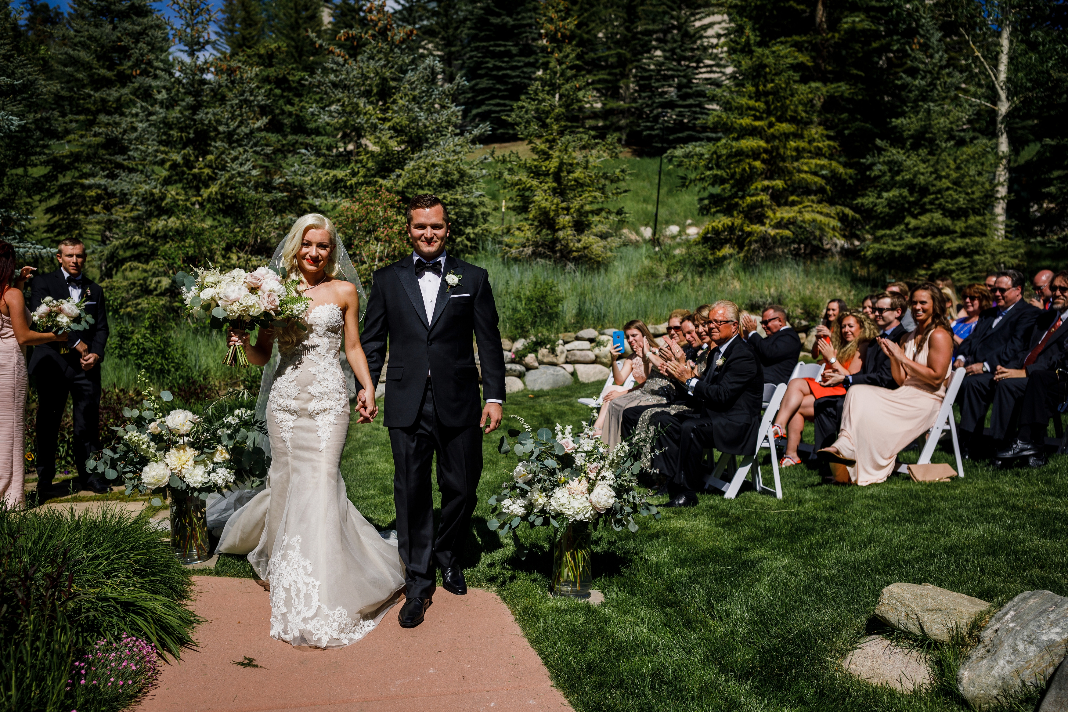 Bride & groom recessional at Park Hyatt Wedding Garden