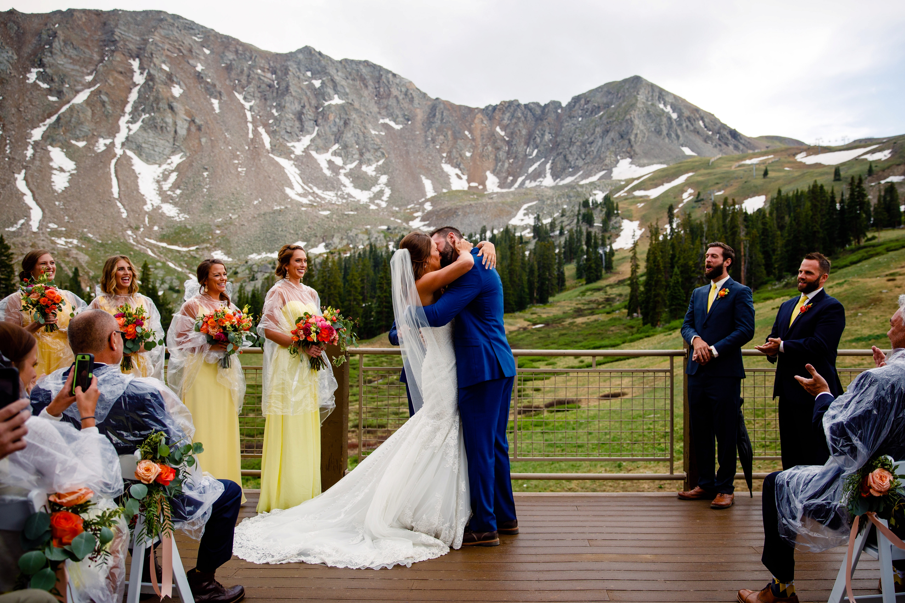 First kiss for bride & groom at Arapahoe Basin Summer Wedding