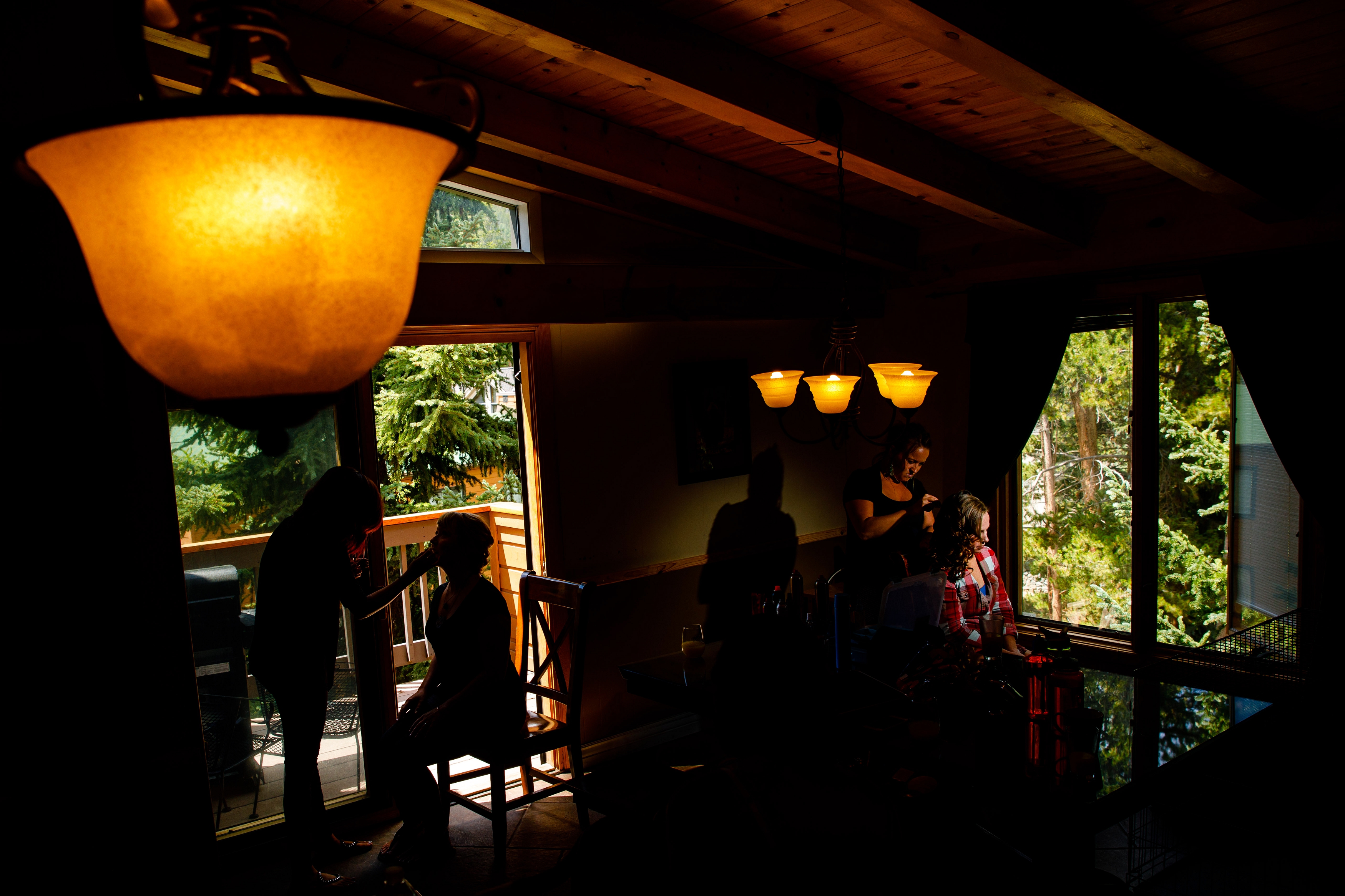 Bride getting her hair done in Keystone, CO before her wedding at A Basin