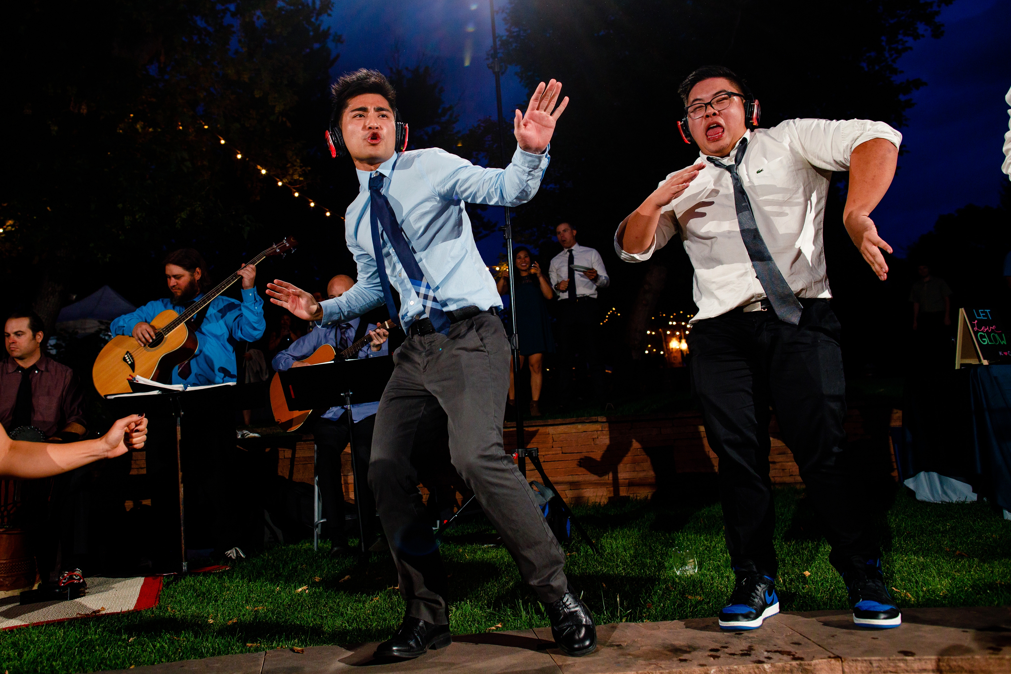 Guests dancing during this silent disco wedding reception at the River Bend.