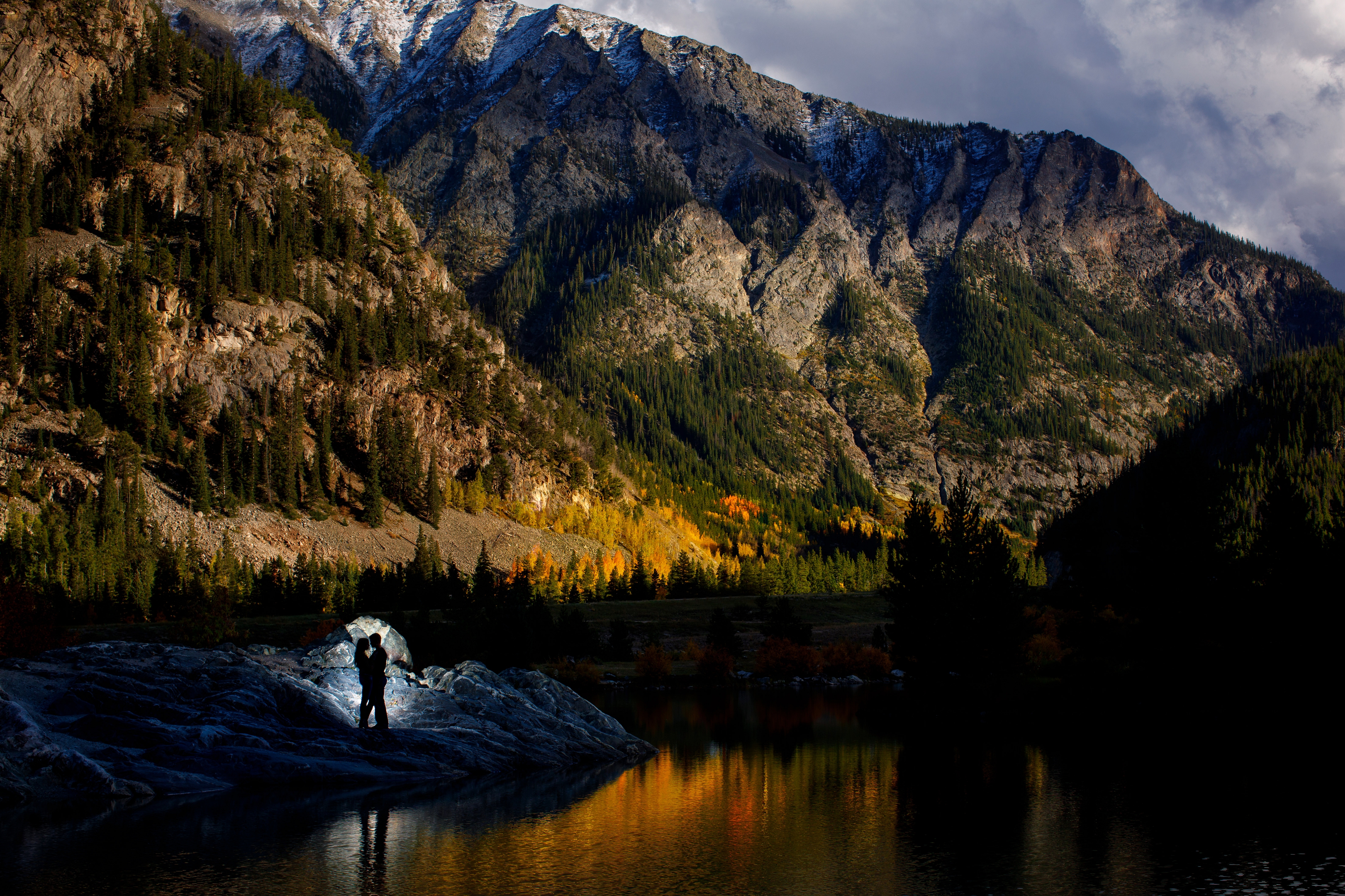 Silouette of a couple during their engagement photo session at Officers Gulch in Colorado.