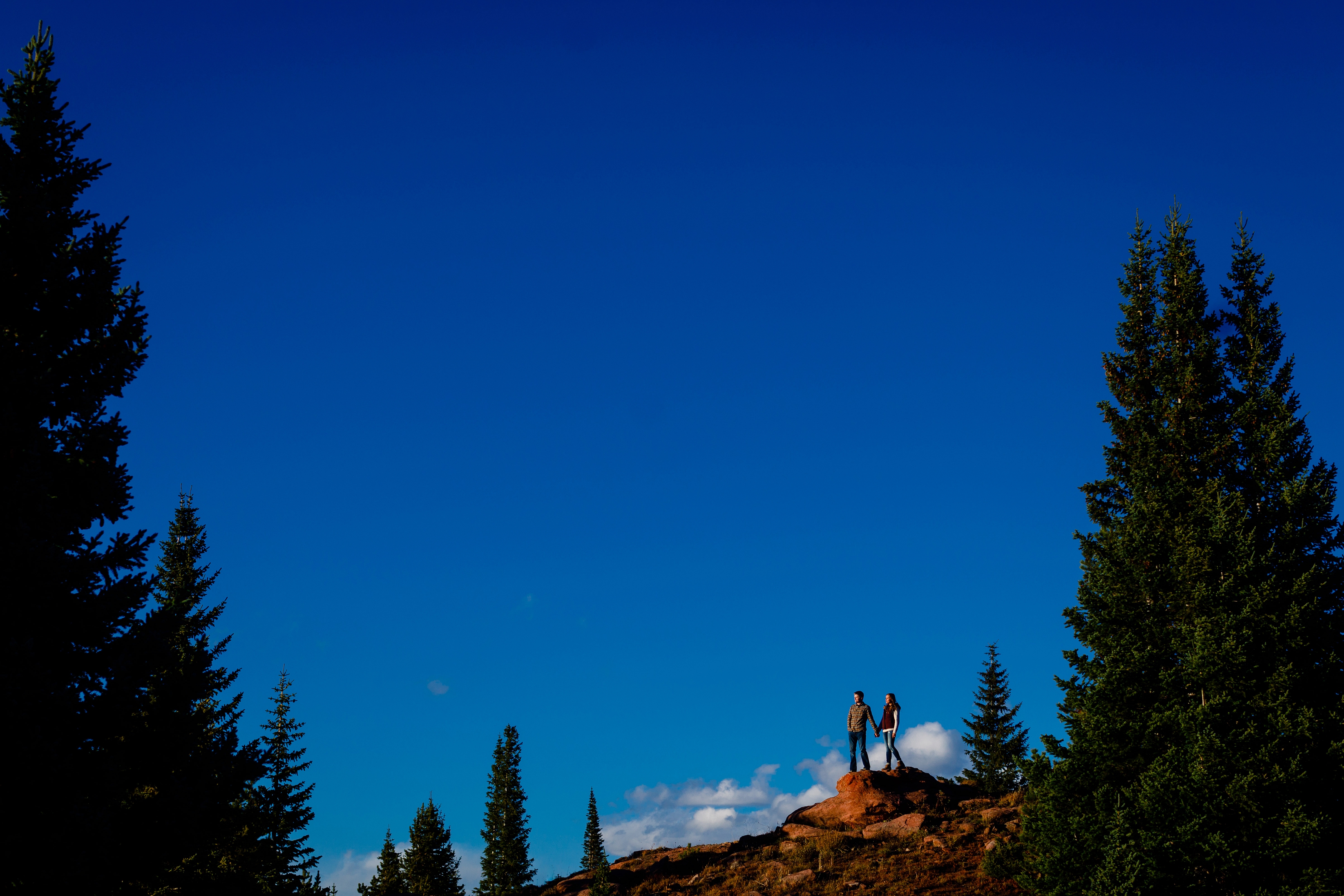 On top of the mountain for their Shrine Pass Engagement near Vail.