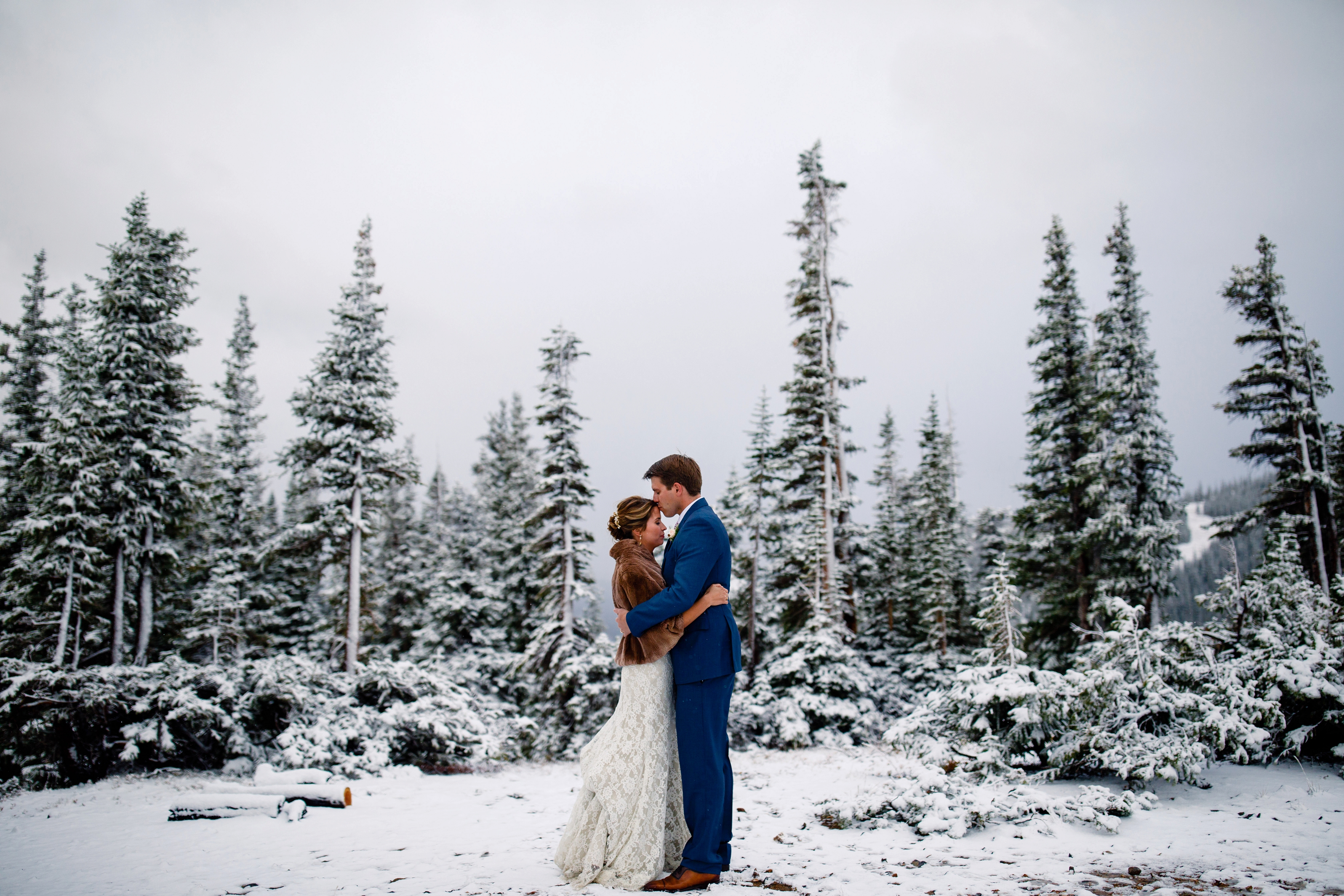 Up above the storm for wedding portraits during their Tenmile Station Fall Wedding.