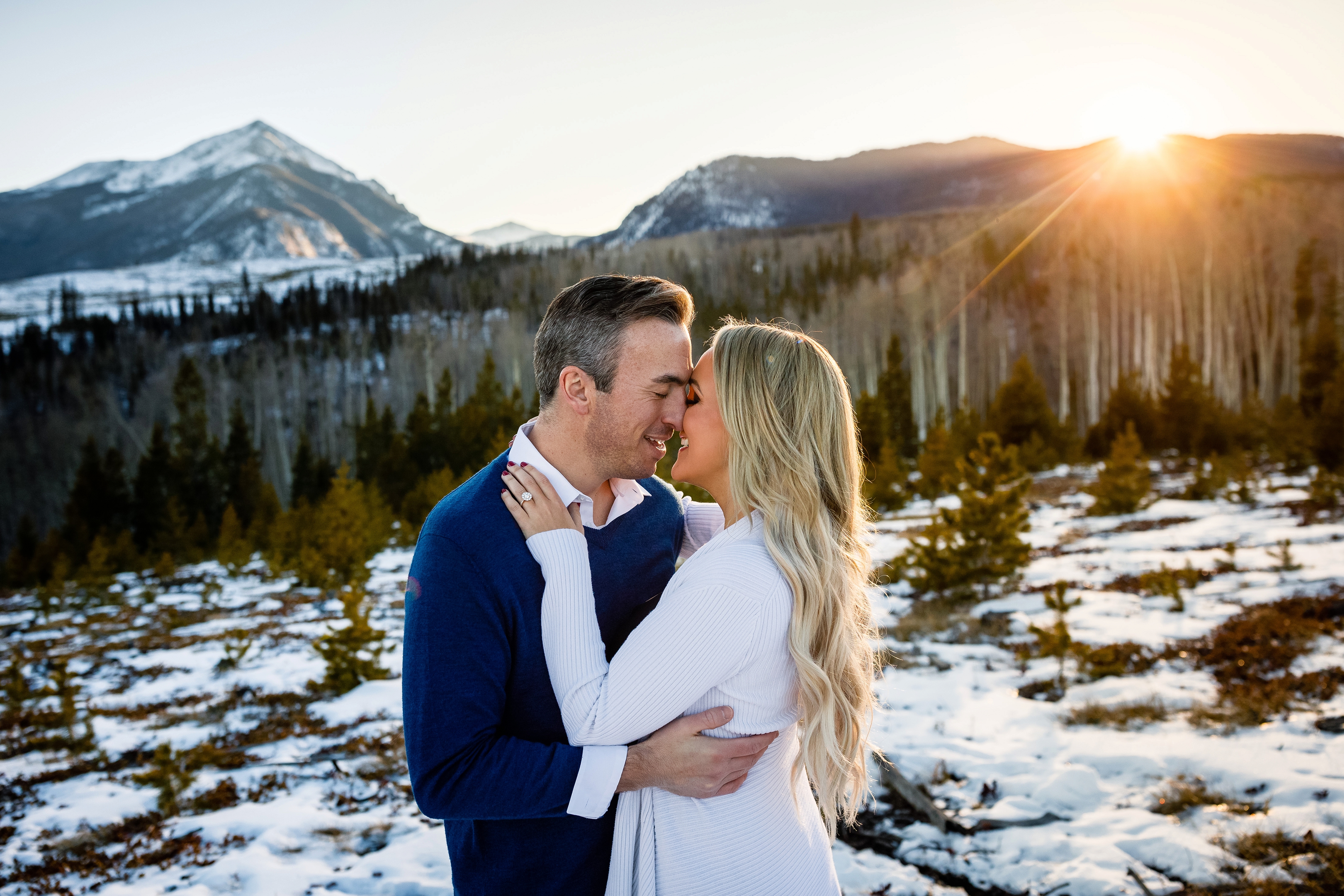 The last bits of sunlight during these two's Winter Silverthorne Engagement.