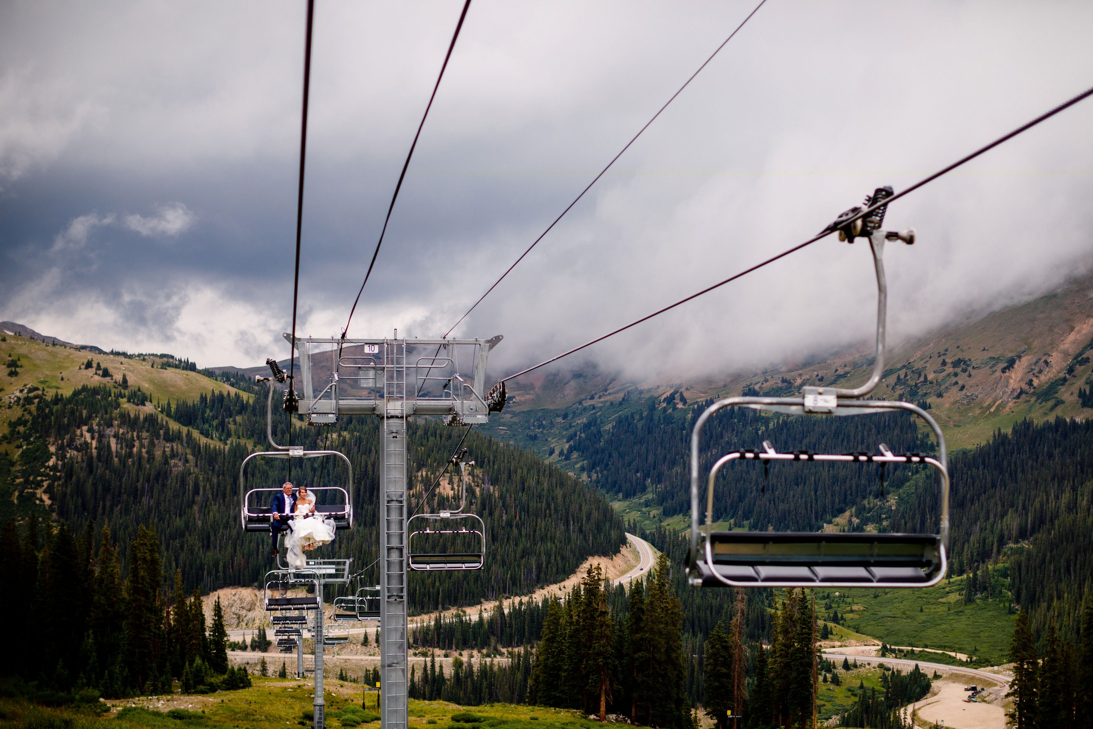 Riding up the chairlift at Arapahoe Basin before walking down the isle to get married at Black Mountain Lodge.