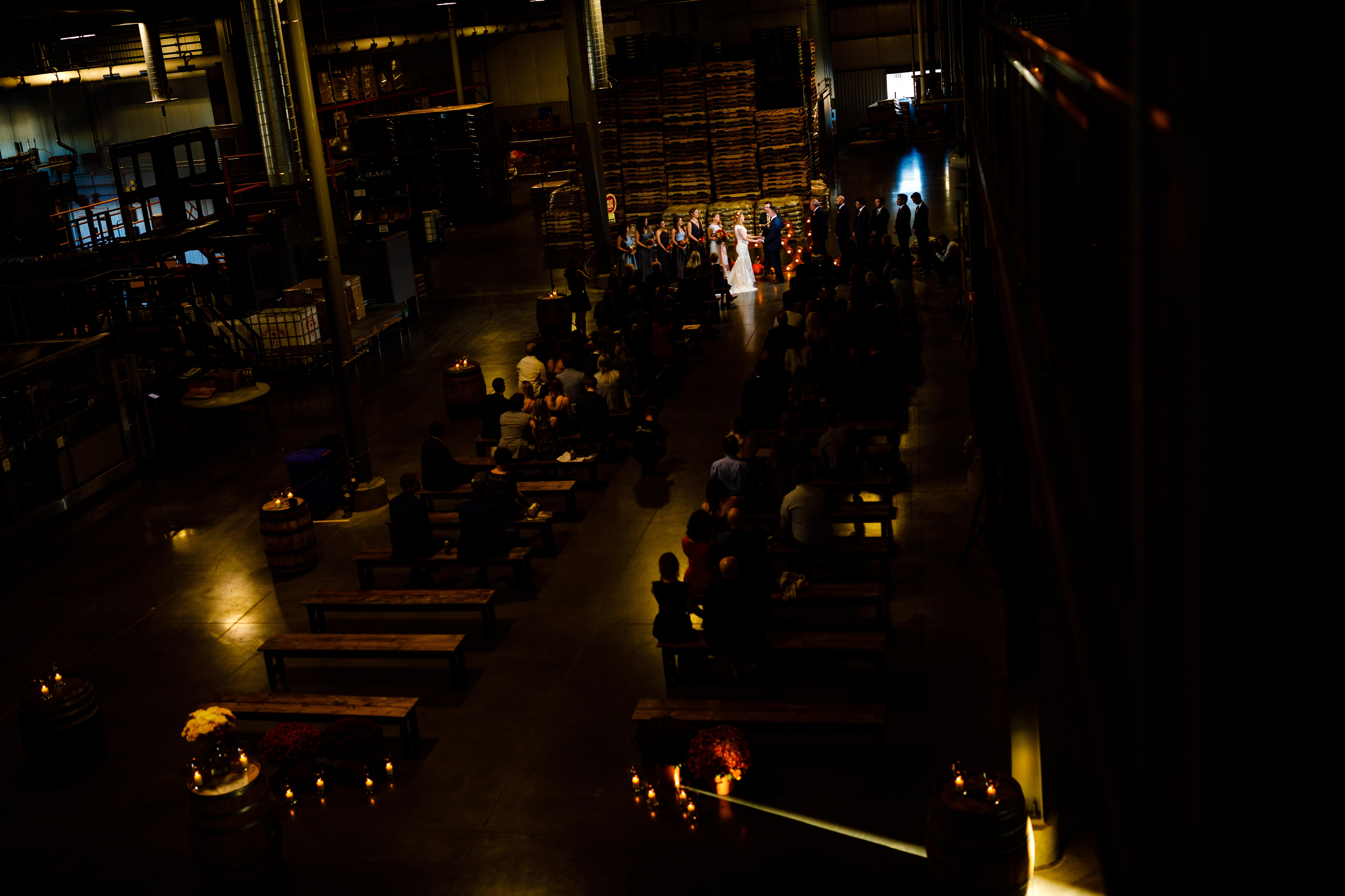 Jake & Jessica exchange vows during their wedding at the Great Divide Brewery in Rino.