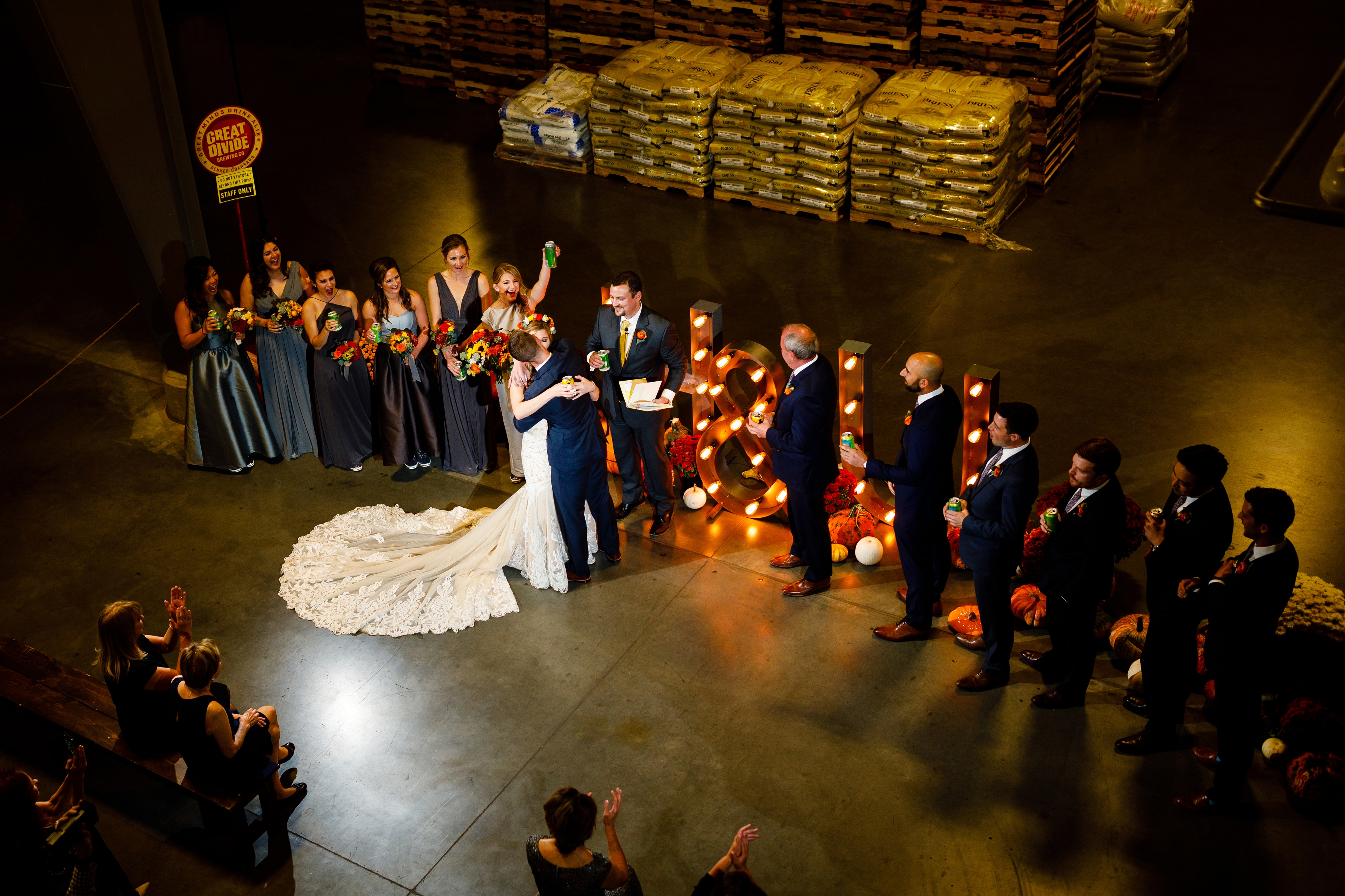 Their first kiss as husband & wife as Great Divide in Denver, CO.