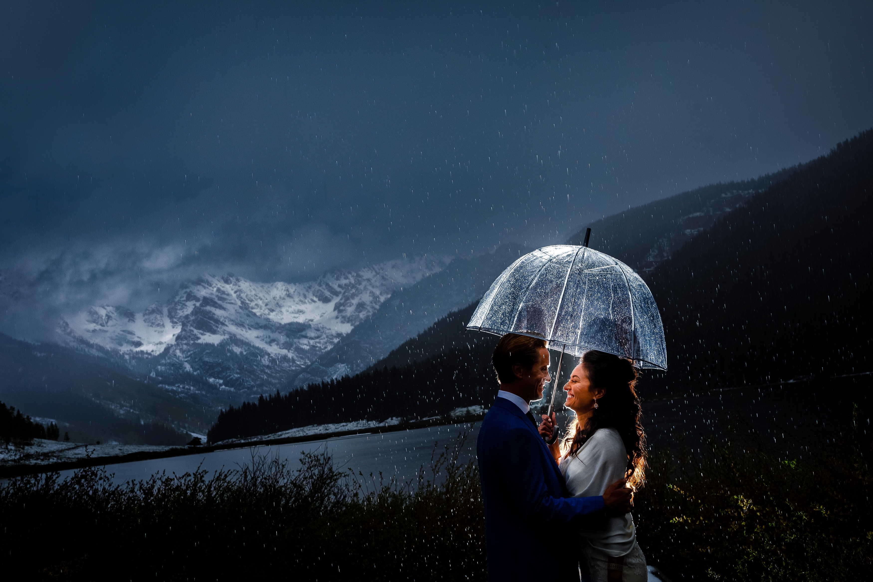 Rain on their wedding day, shortly before the ceremony on the Piney River Ranch Wedding Deck.