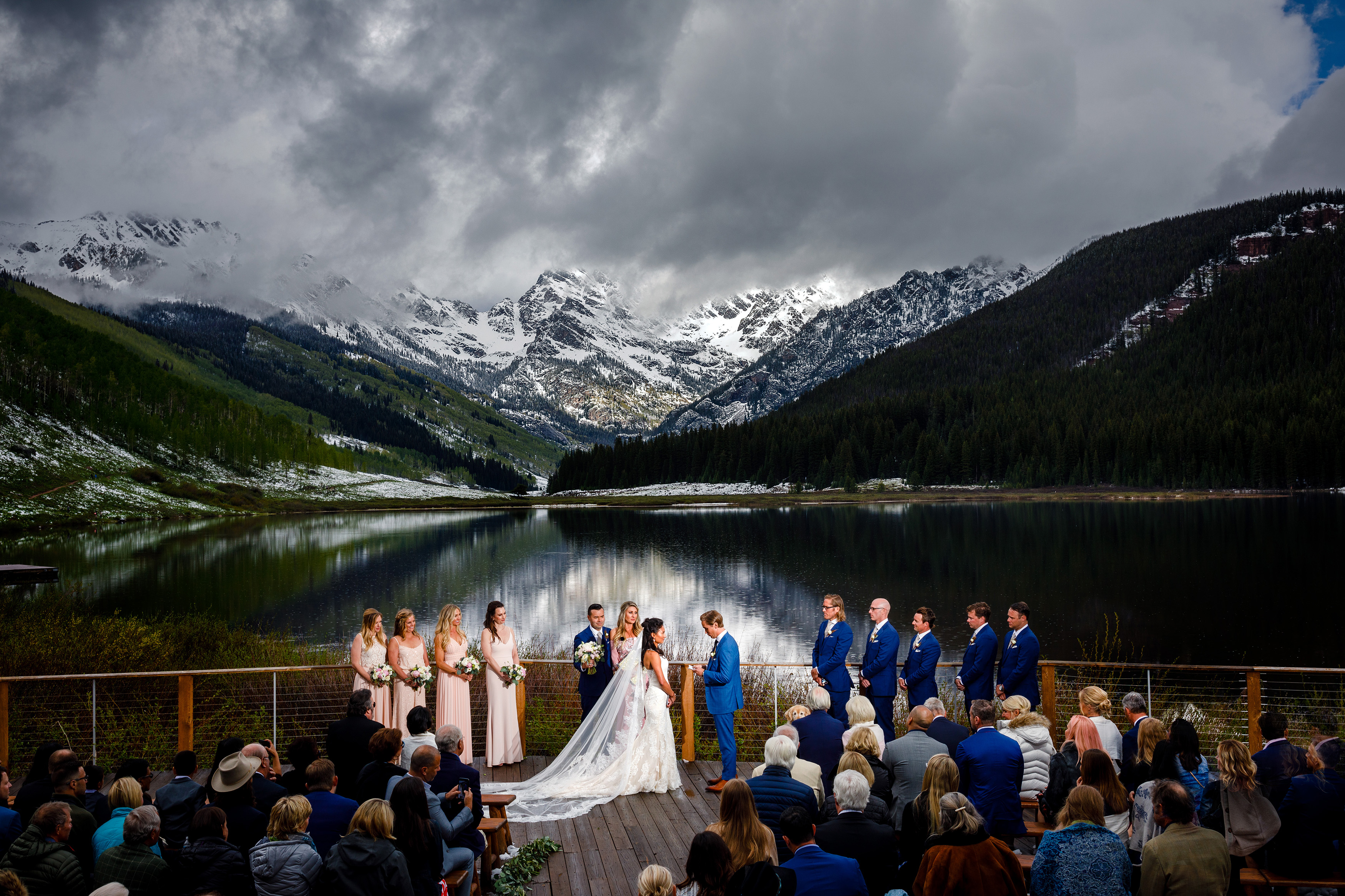 Whitney & Krystal's ceremony photo of the Piney River Ranch Deck just after a snowstorm in June.