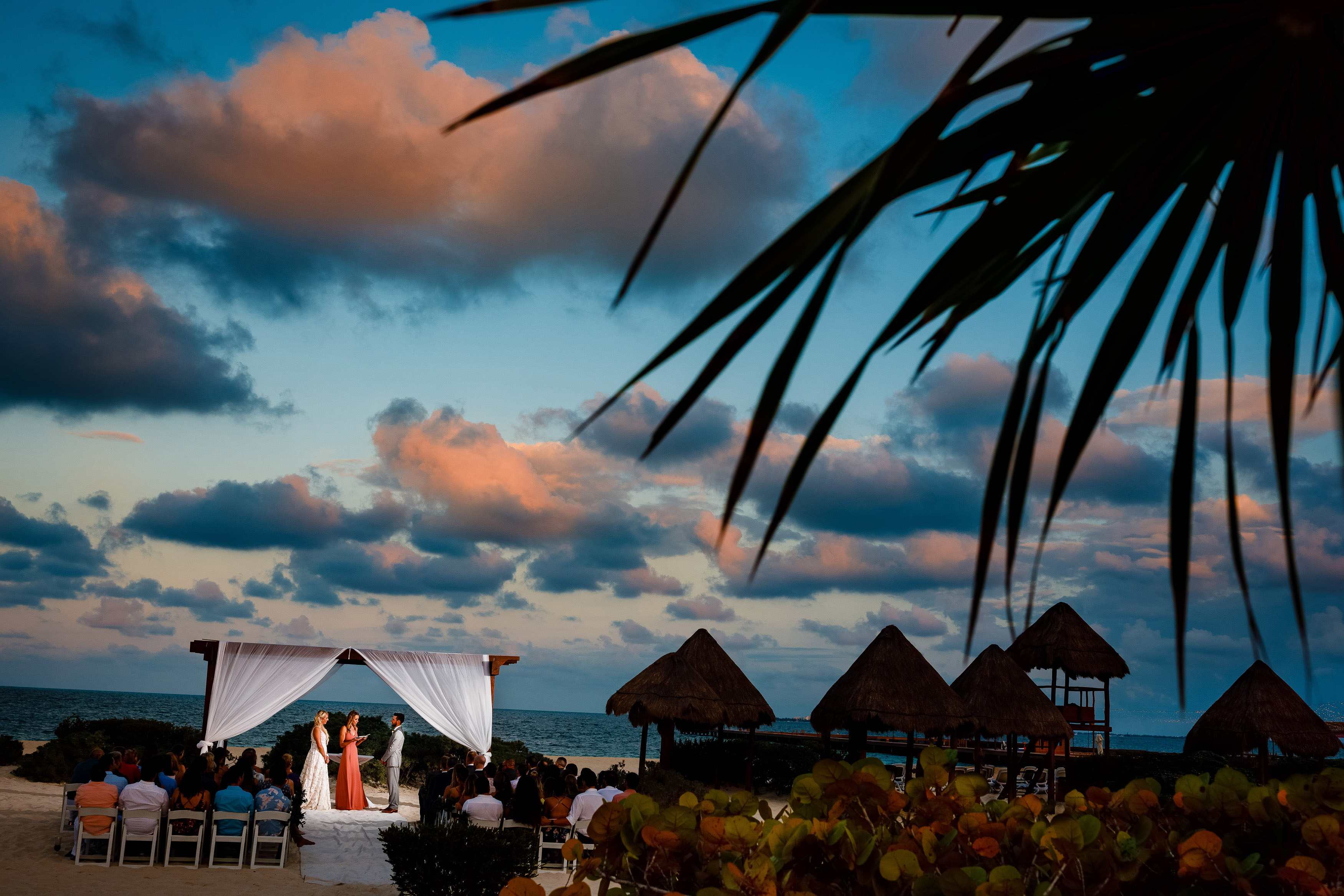 A sunset wedding ceremony at the Dreams Playa Mujeres Resort in Quintana Roo.