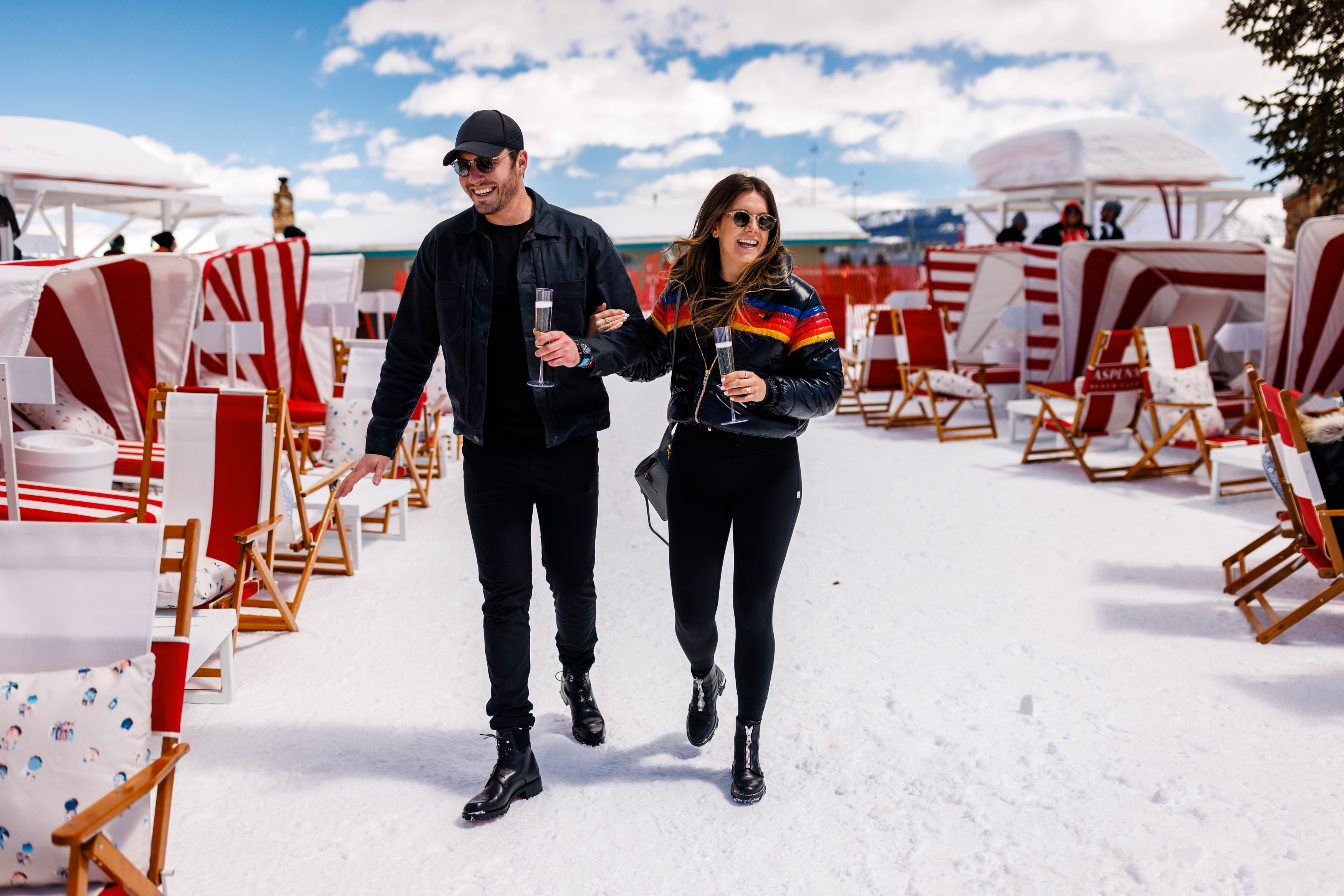 Zach & Molley walking into the ASPENX Beach Club shortly after their proposal on top of Aspen Mountain.