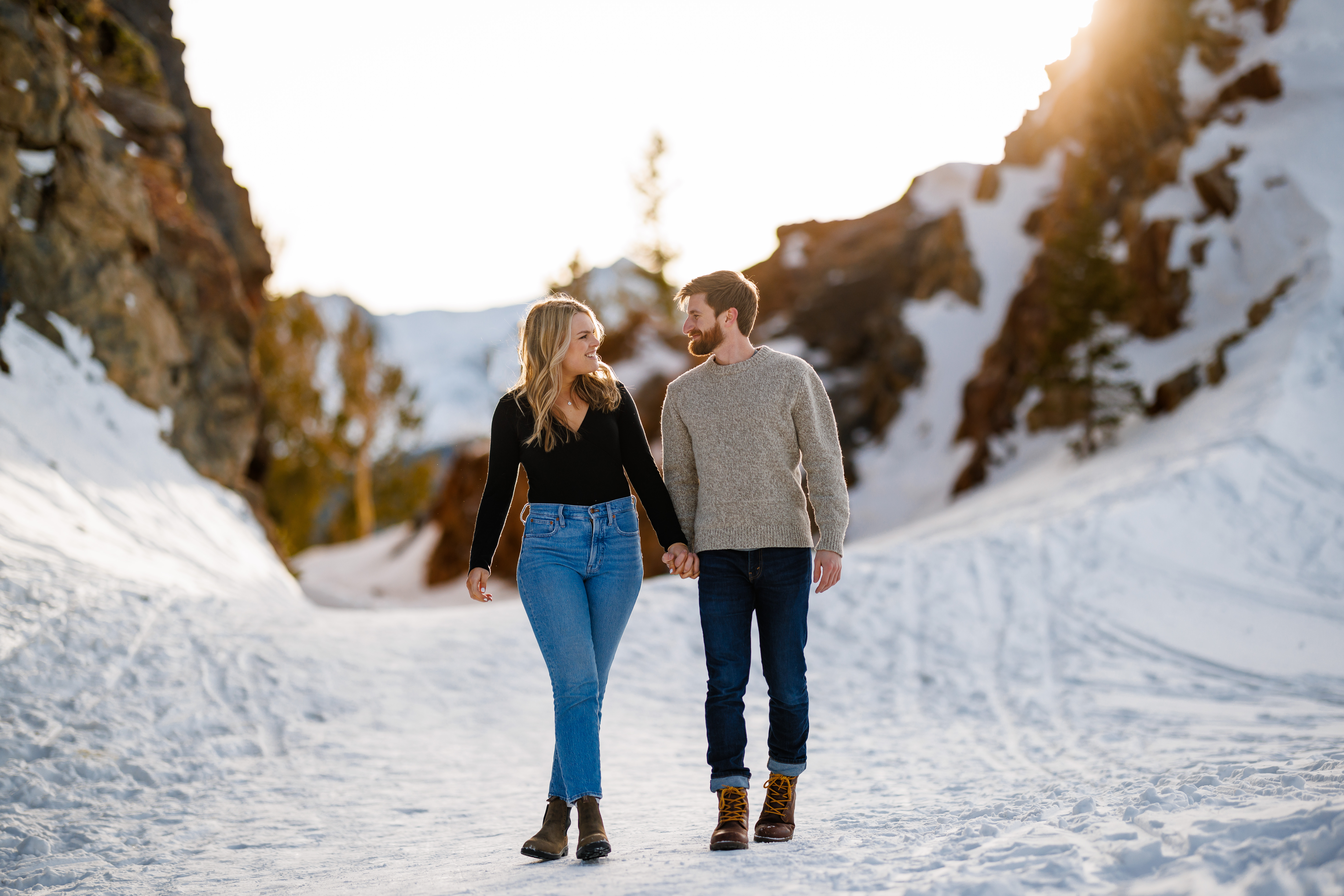 Walking on top of several feet of snow for their Breckenridge Engagement session on Boreas Pass.
